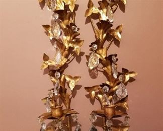 $16-Pair of gold candleholders with dangling crystals. Missing a few crystals. Measures 19" 