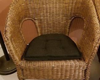 $30-Set of 4 wicker chairs with removable brown pads. 2 have slight damage. Measure 31"×24" seat height 17"