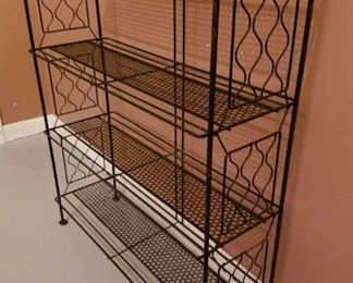 SOLD  metal three-tiered shelf. (26"x9"x31")