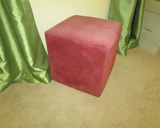 Red upholstered ottoman. 16"w X 16"d X 16"h PRICE: $25.00