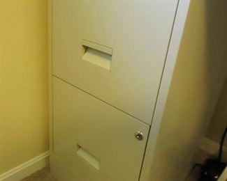 Metal 2-drawer file cabinet. 15"w X 18"d X 29"h PRICE: $30.00