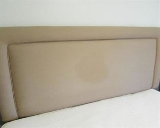 Queen padded headboard. HEADBOARD ONLY). (Condition note: spot to fabric as seen in photo). 61"w X 51"h PRICE: $40.00