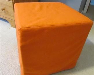 15" square cube upholstered orange ottoman from Ikea. PRICE: $30.00