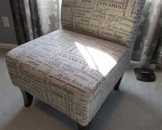 Accent chair with script-printed upholstery. 23"w X 35"h X 27"d PRICE: $110.00