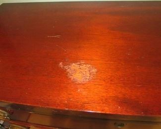 imperfection to finish on top of vintage mahogany bachelor's chest