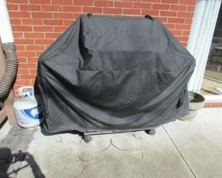 Weber Genesis grill with cover and propane tank