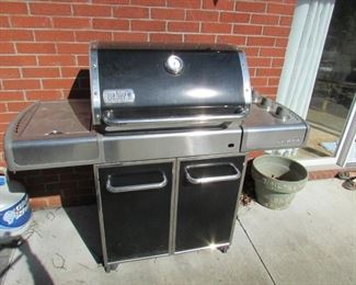 Weber Genesis grill with cover and propane tank. Igniter not working, but does grill fine when lit. 54"w X 48"h X 22"d PRICE: $175.00 as-is