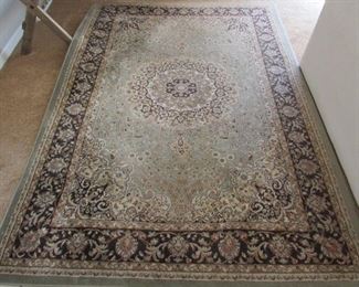 Safaveih area rug. 5'3" X 7'6" PRICE: $75.00