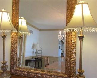 Ornate gilded mirror. 32.25"w X 44.25"h PRICE: $100.00