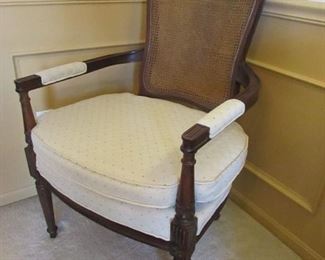French-style armchair with caned back and custom re-upholstery. 24"w X 36"h X 20"d PRICE: $110.00