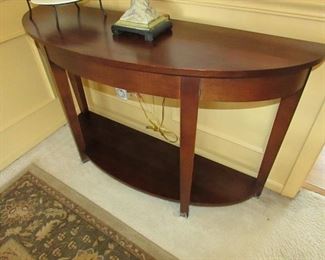 Broyhill demilune / console table. 50"w X 29.5" h X 16"d PRICE: $125.00