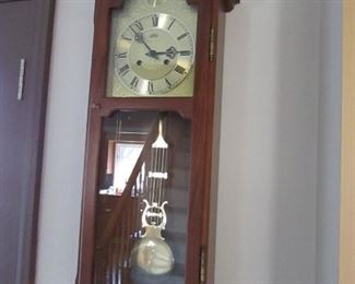 AMS German wall clock. 11.5"w X 32"h X 5.5"d PRICE: $80.00