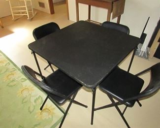 Cosco 34" square folding card table with (4) folding chairs. Black color. PRICE: $40.00 for SET