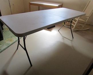 6' half-fold folding table. PRICE: $22.00