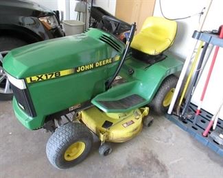 1995 John Deere LX178 riding mower with hydrostatic automatic drive. 38" mowing deck and bagger. Runs! $500.00