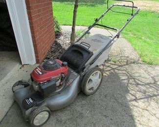 21" Craftsman Self-Propelled push mower with bagger and Honda engine. Working! PRICE: $150.00