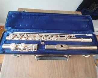 Flute with silver mouthpiec $ 175.