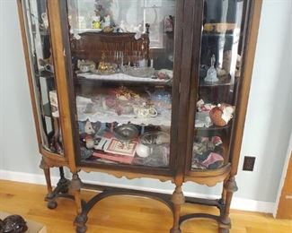 Unusual curved glass china cabinet
$250