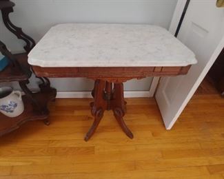Victorian marble top table needs a little TLC missing a piece from one foot $55
Now $45