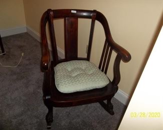 Old claw foot rocking chair. $125