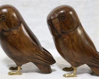 Wooden owls with brass feet