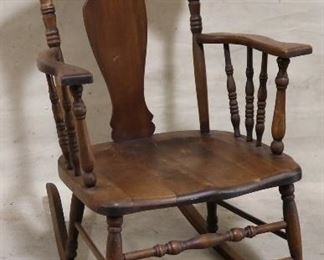 Vintage mahogany spindle carved rocking chair