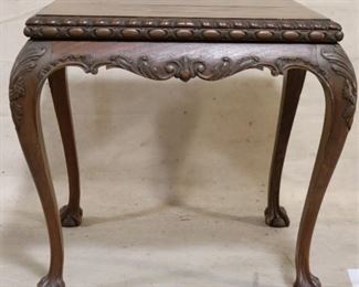 Claw foot carved table