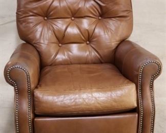 Leather recliner with nail head trim