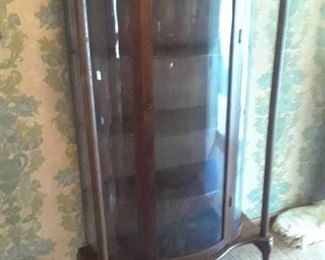 ANTIQUE CURIO WITH CURVED GLASS