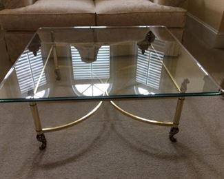 Brass coffee table with beveled glass top from Haverty's 39 1/2 by 39 1/2  @ $250.00 