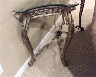 GLASS TOP SOFA TABLE THAT MATCHES THE TWO END TABLES MEASURING  70 X 24 AND 33 INCHES TALL $350.00. 
