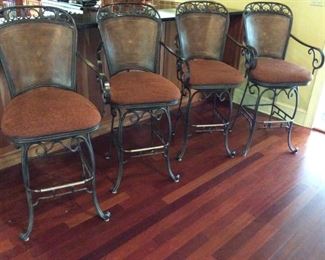 4 beautiful bar stools for high counter top. Priced at $125.00 each.