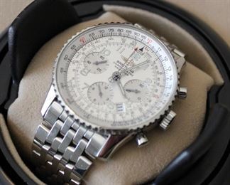 3. $3,900 - Breitling Navitimer A23322 - Excellent condition, runs, serial number 2242570, includes box, case, warranty, extra links, instructions, extra links