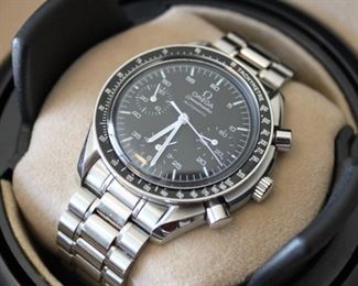 5. SOLD - Omega Speedmaster Automatic With Black Dial 1998 - Excellent condition, runs, serial number 58479278, 811 bracelet, includes box, case, International Warranty card, Pictograms card