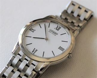 12. $100 - Citizen Eco-Drive Stiletto w/ White Dial - Excellent condition, not running