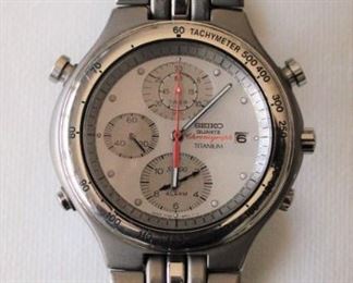 18.  $70 - Seiko Quartz Chronograph Titanium w/ silver dial - Excellent condition, not running