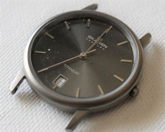 21. $30 - Skagen Titanium watch, no band - Excellent condition, not running
