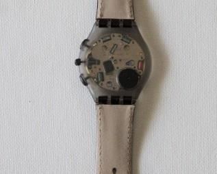 23. $60 - Swatch Flat Zone Chronograph 2001 w/ leather band - Excellent condition, not running