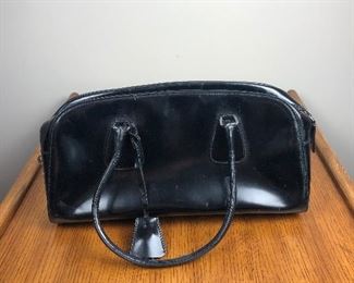 Lot 7: Authentic PRADA leather bag; 14” wide, 7” tall; $245 (discounts not applicable)