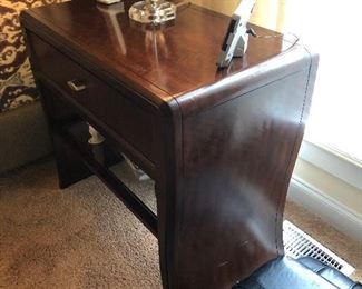 Lot 16: Century Furniture End Table, glass top bottom shelf, drawer; 32” x 18” deep x 29” tall; $195