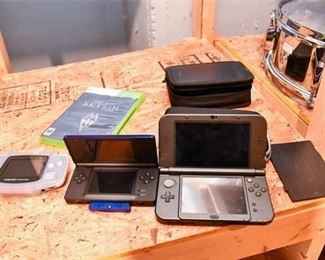 43. Three Portable Gaming Systems