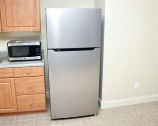 104. Insignia Stainless Steel Refrigerator