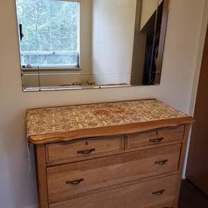 Beautiful Antique dresser with wall mirror included.