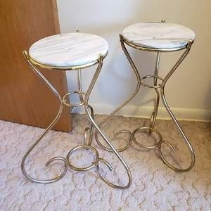 2 plant stands with marble tops