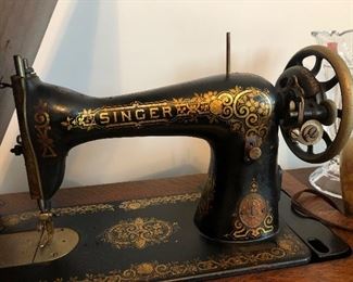 Antique Singer treadle sewing machine with cabinet, no belt-$125
