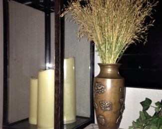 Black lantern; brass vase; old books