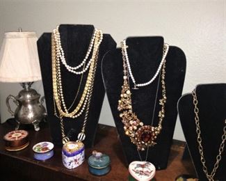 Small enamel boxes; necklaces