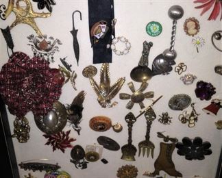 Another framed collection of pins (glass as is)