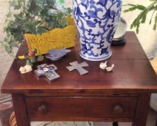 Small 1-drawer table; crosses; blue & white vase