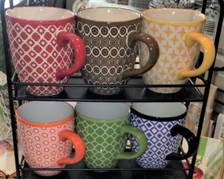 Darling mugs on a black stand